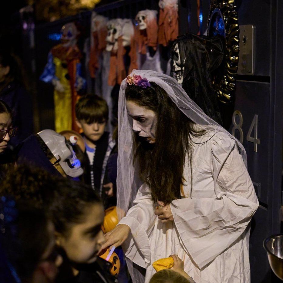 Halloween and a declining Christian tradition coexist on All Saints' Day in Spain